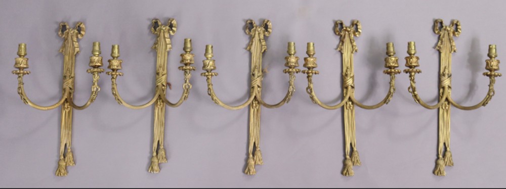 Set of five classical style ribbon and swag wall lights 