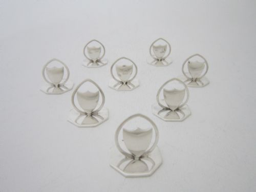 A SET OF EIGHT ANTIQUE EDWARDIAN STERLING SILVER MENUPLACE CARD HOLDERS - ADDITIONAL PHOTO 2