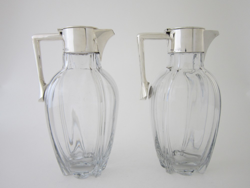 Victorian Silver and glass claret jugs View II
