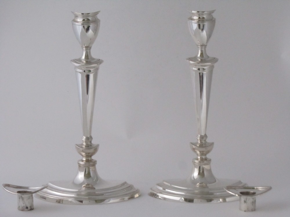 A pair of Antique George V Sterling silver candlesticks View II