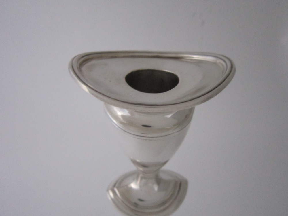 A pair of Antique George V Sterling silver candlesticks View III