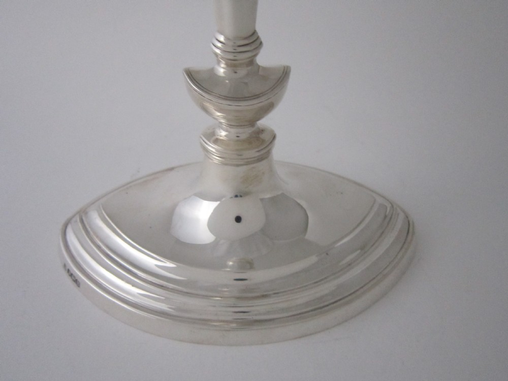 A pair of Antique George V Sterling silver candlesticks View IV
