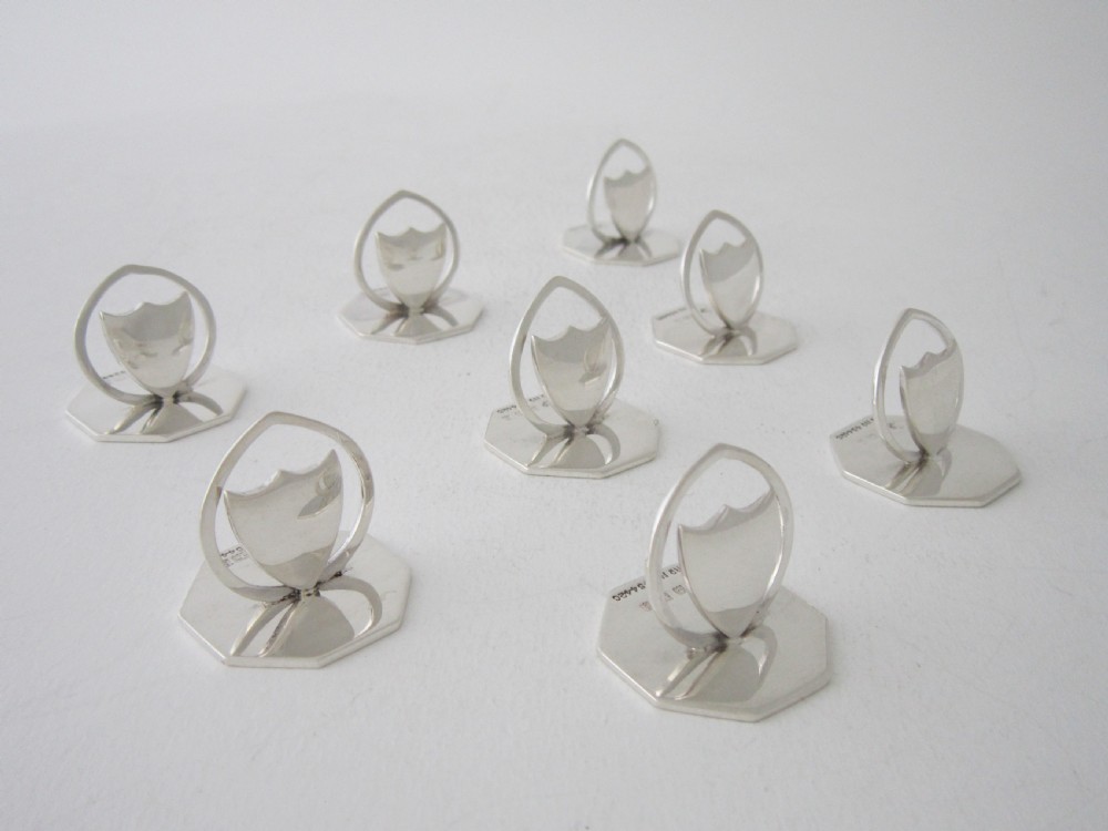 A set of eight Antique Edwardian Sterling silver menu/place card holders View II