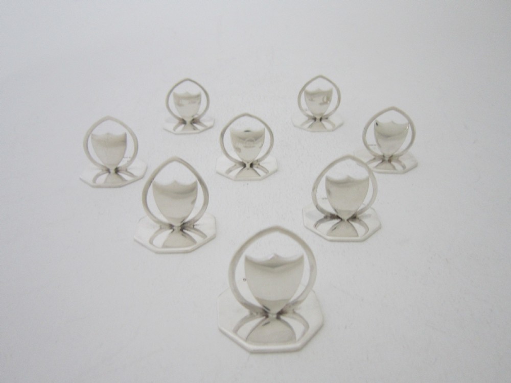 A set of eight Antique Edwardian Sterling silver menu/place card holders View III