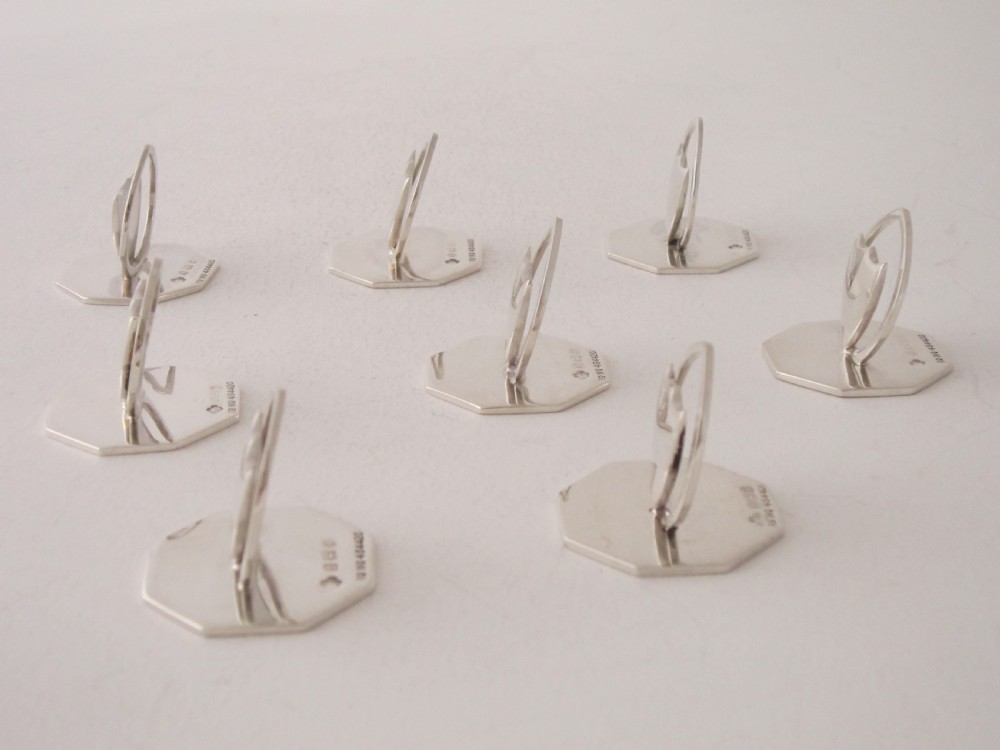 A set of eight Antique Edwardian Sterling silver menu/place card holders View V