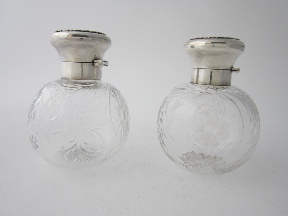Antique George V Sterling silver and glass scent bottles View II