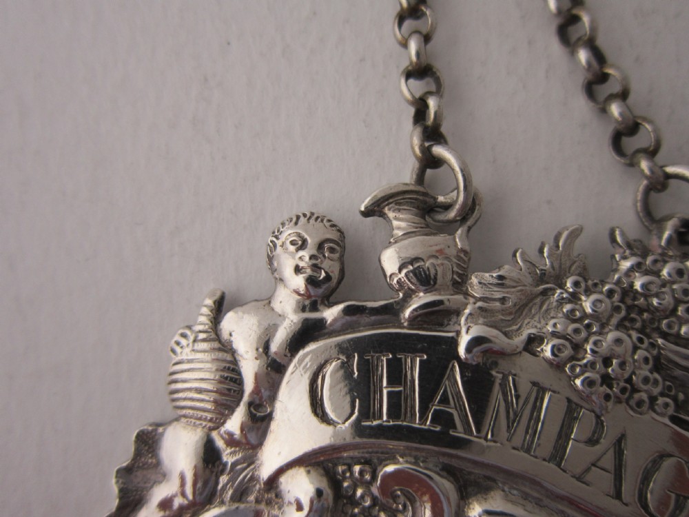 Antique George II Sterling silver Champagne wine label View III