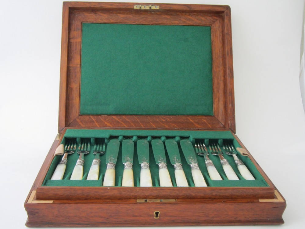 Antique Edwardian Sterling silver and Mother of Pearl fish cutlery set View II