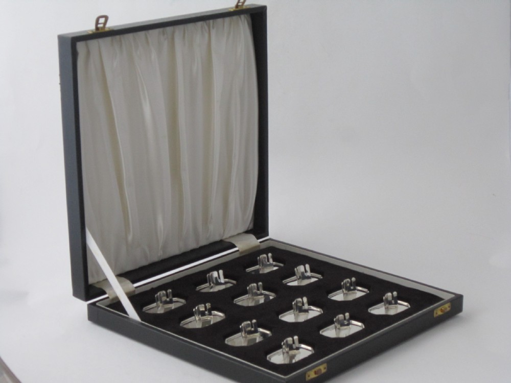 Set of 12 Elizabeth II Sterling Silver Place Card Holders - 1961 View II