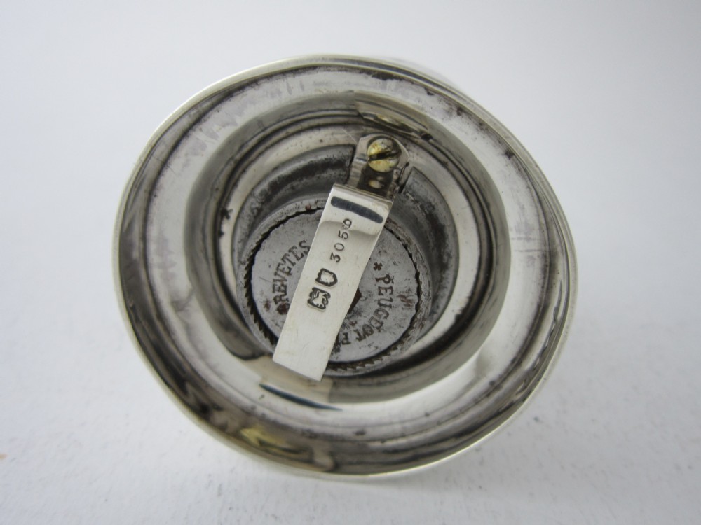 Victorian sterling silver and clear glass pepper grinder featuring hallmarked silver rims and a turned top knob. View IV