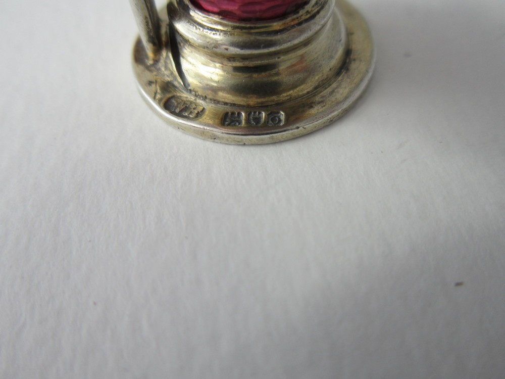 A set of four Edwardian sterling silver place card holders featuring pink guilloche enamel columns topped with sculpted game birds inside a fitted presentation box. View XIV