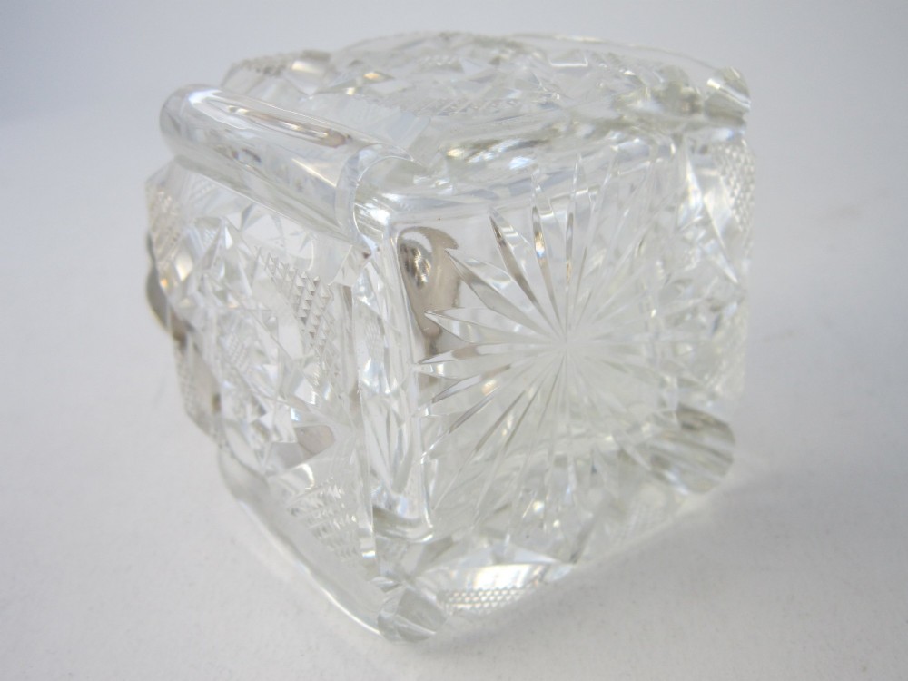 A George V sterling silver tray featuring a pierced gallery, scroll feet, a central pen recess, and two square cut-glass inkwells with silver lids. View XII