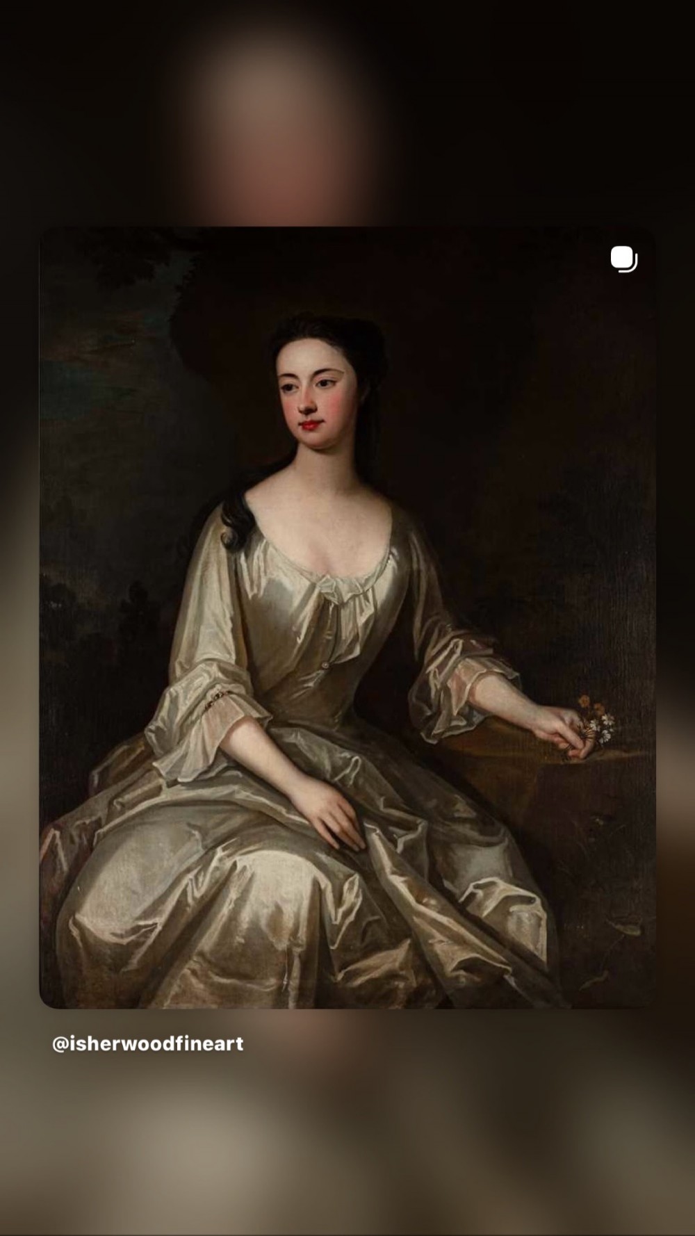 An early eighteenth-century oil painting on canvas depicting a seated lady in a silk gown within a carved giltwood frame. View II