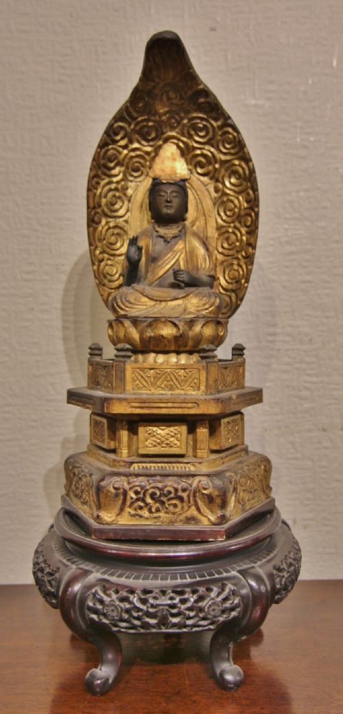 19TH CENTURY CARVED GILT WOOD BUDDHA ON STAND