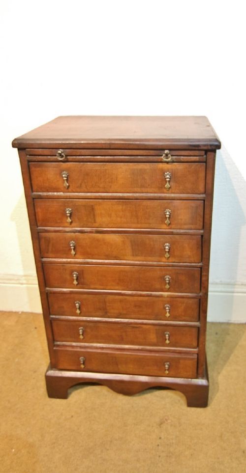WALNUT COLLECTORS CHEST OF DRAWERS