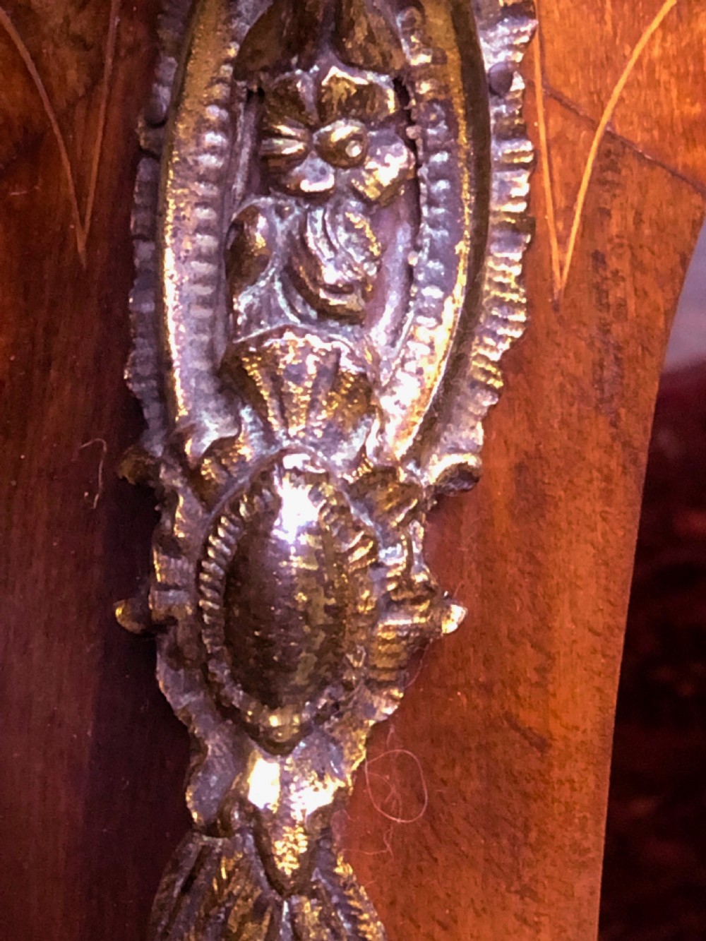 A 19th-century French Louis XV style inlaid writing desk featuring floral marquetry, a serpentine top, cabriole legs, and gilt-bronze mounts. View IX
