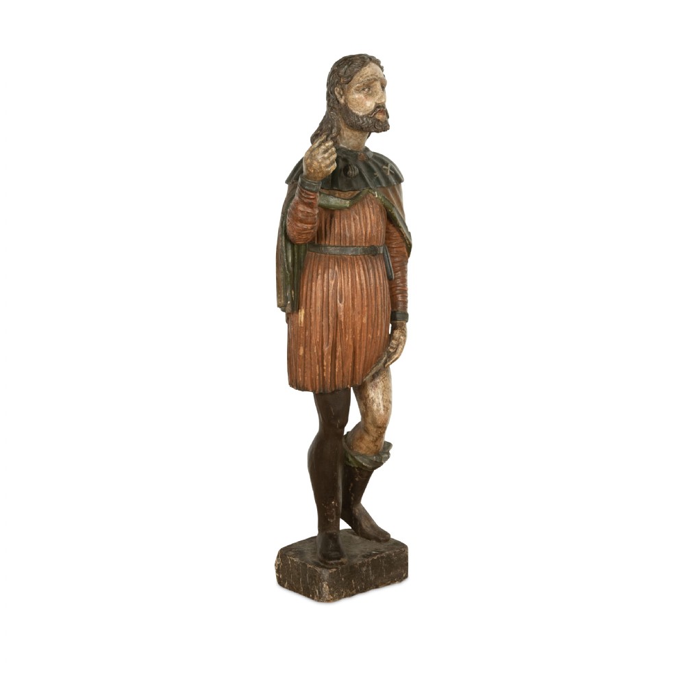 An 18th-century carved wooden polychrome statue depicting Saint Roch standing on a square timber base. View II