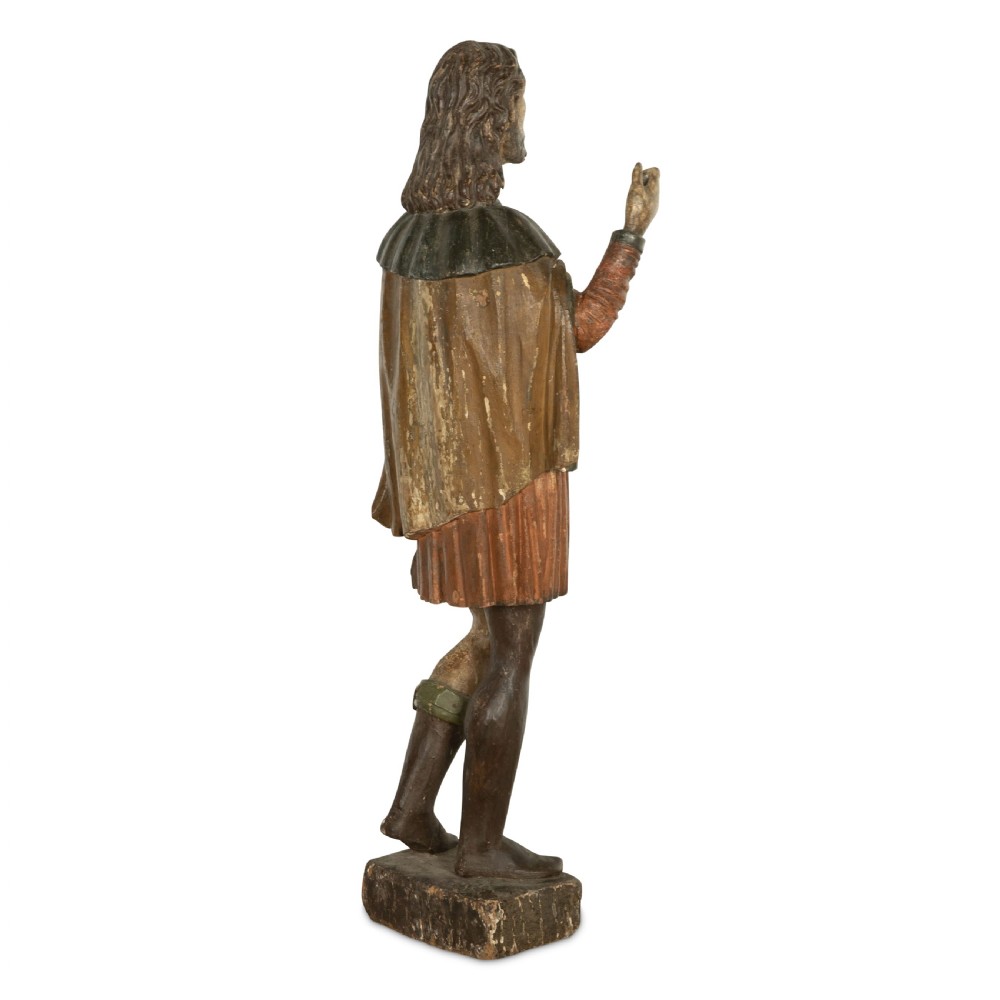 An 18th-century carved wooden polychrome statue depicting Saint Roch standing on a square timber base. View III