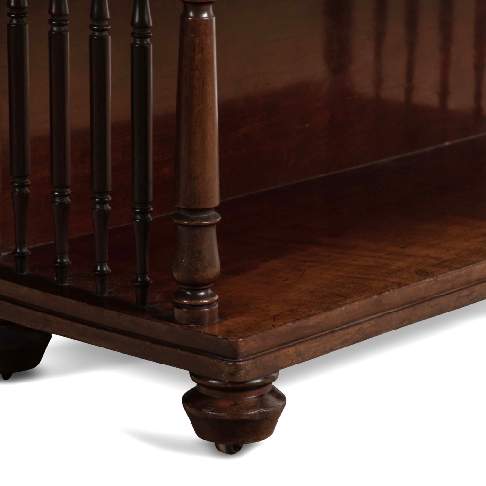 A matching pair of dark brown 19th-century Regency mahogany open bookcases featuring four tiers supported by turned side spindles. View VII
