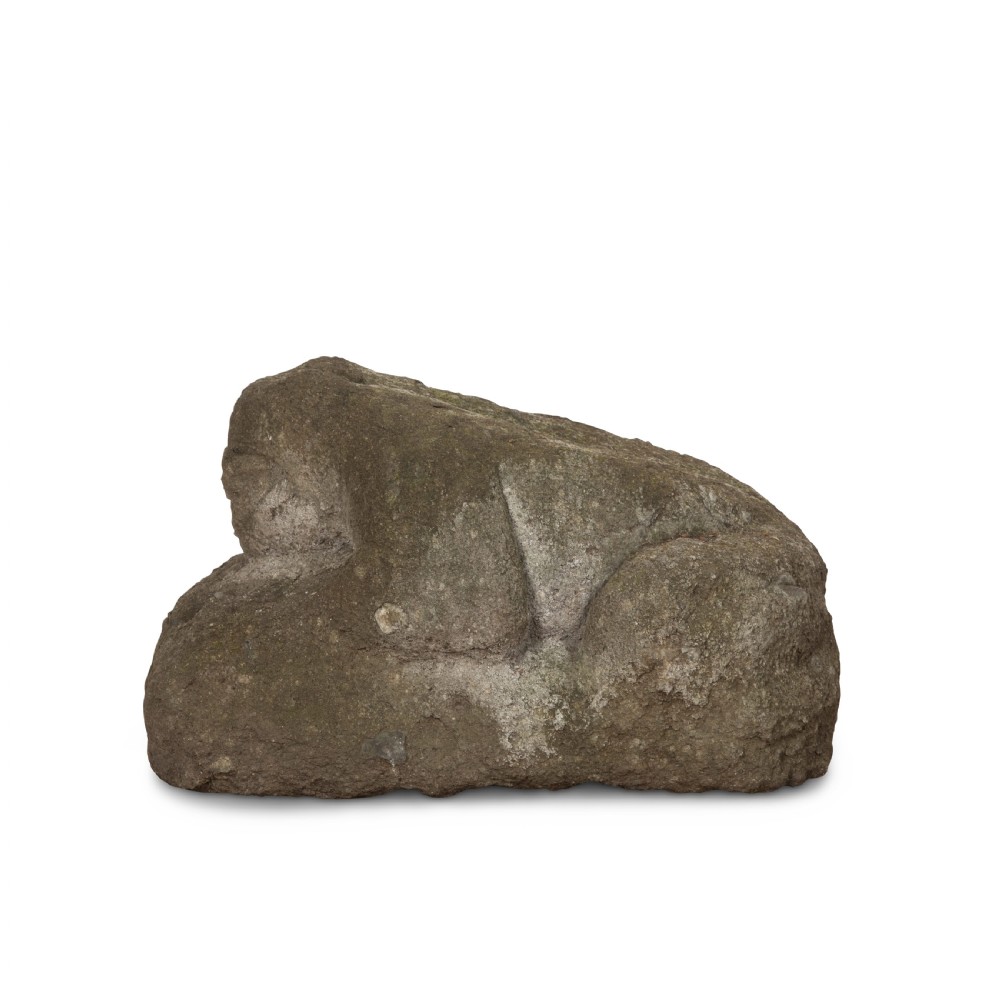 A hand-carved grey stone sculpture depicting a sitting frog with weathered surface textures. View IV