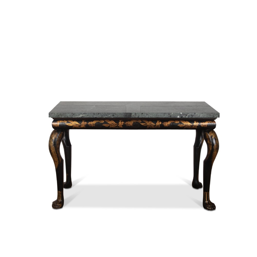 A Regency style ebonised and gilt Chinoiserie console table featuring a grey-green marble top and carved cabriole legs with paw feet. View II