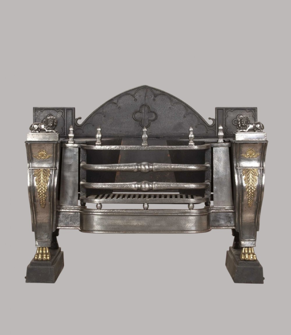 A superior Regency cast and wrought iron ‘hob’ Fire Grate of classical design