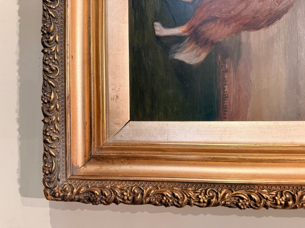 A 19th-century oil painting on board depicting a sable and white Rough Collie in profile against an open landscape, set within an ornate gilt frame. View II
