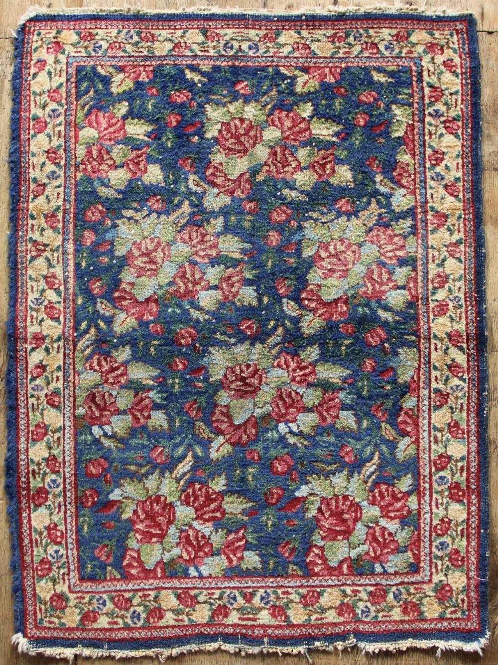60 x 81cm Antique Kirman rug