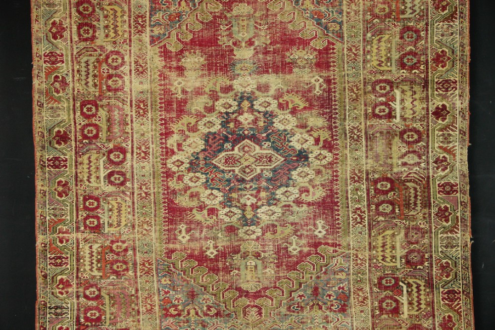147 x 274cm Antique Ghiordes Carpet View II