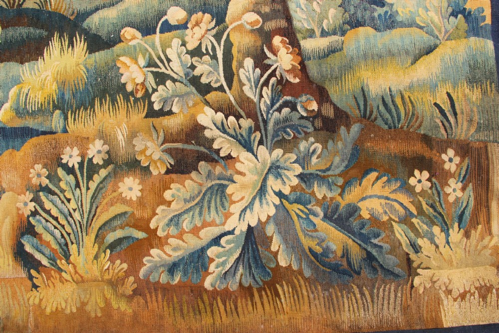 A large hand-woven French Aubusson verdure tapestry depicting swans swimming on a woodland river surrounded by trees and foliage. View VIII