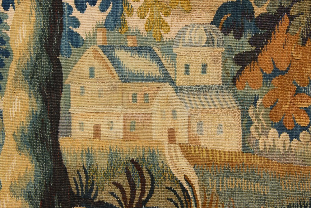 A large hand-woven French Aubusson verdure tapestry depicting swans swimming on a woodland river surrounded by trees and foliage. View XII