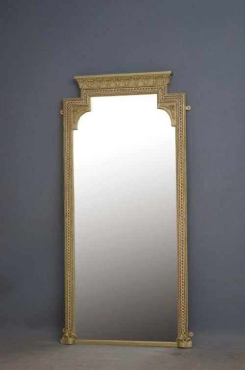 A tall, rectangular Victorian giltwood pier mirror featuring a stepped cresting cornice, beaded moulding, and arched upper frame profile.