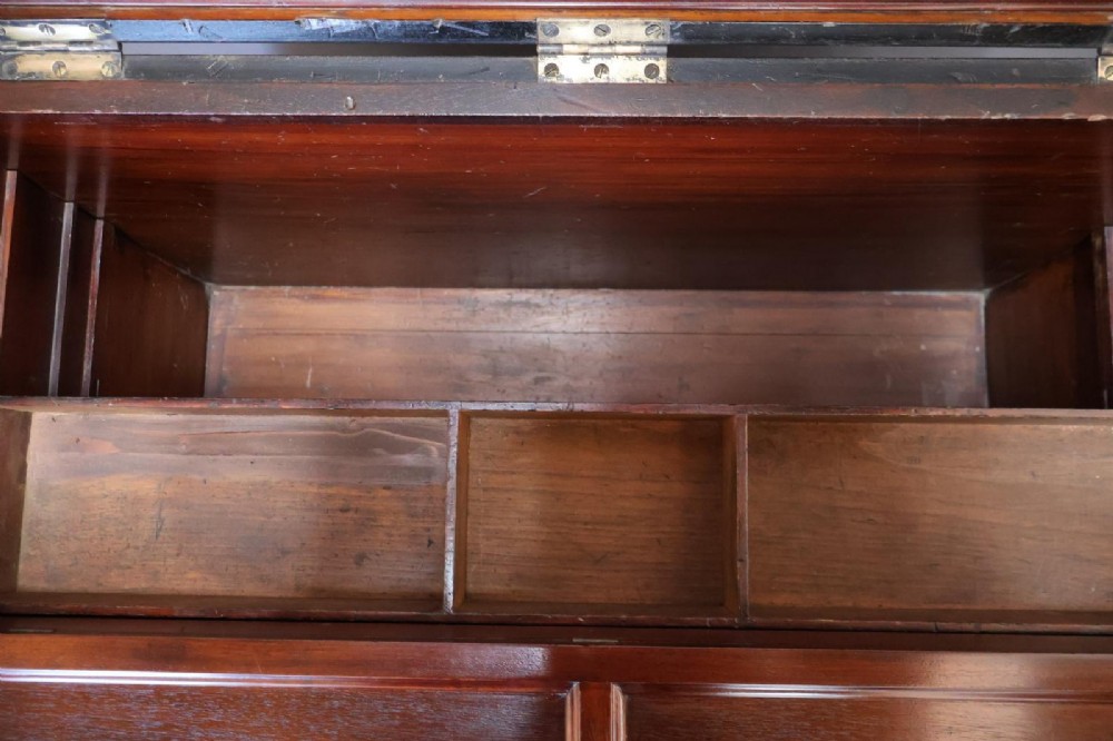 A Victorian painted wooden cabinet makers tool chest with hand-painted lettering on the front exterior and a mahogany fitted interior with geometric lid panelling. View XII