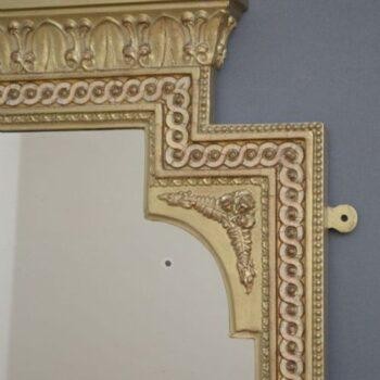 A tall, rectangular Victorian giltwood pier mirror featuring a stepped cresting cornice, beaded moulding, and arched upper frame profile. View III