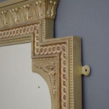 A tall, rectangular Victorian giltwood pier mirror featuring a stepped cresting cornice, beaded moulding, and arched upper frame profile. View VI