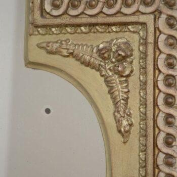 A tall, rectangular Victorian giltwood pier mirror featuring a stepped cresting cornice, beaded moulding, and arched upper frame profile. View VII