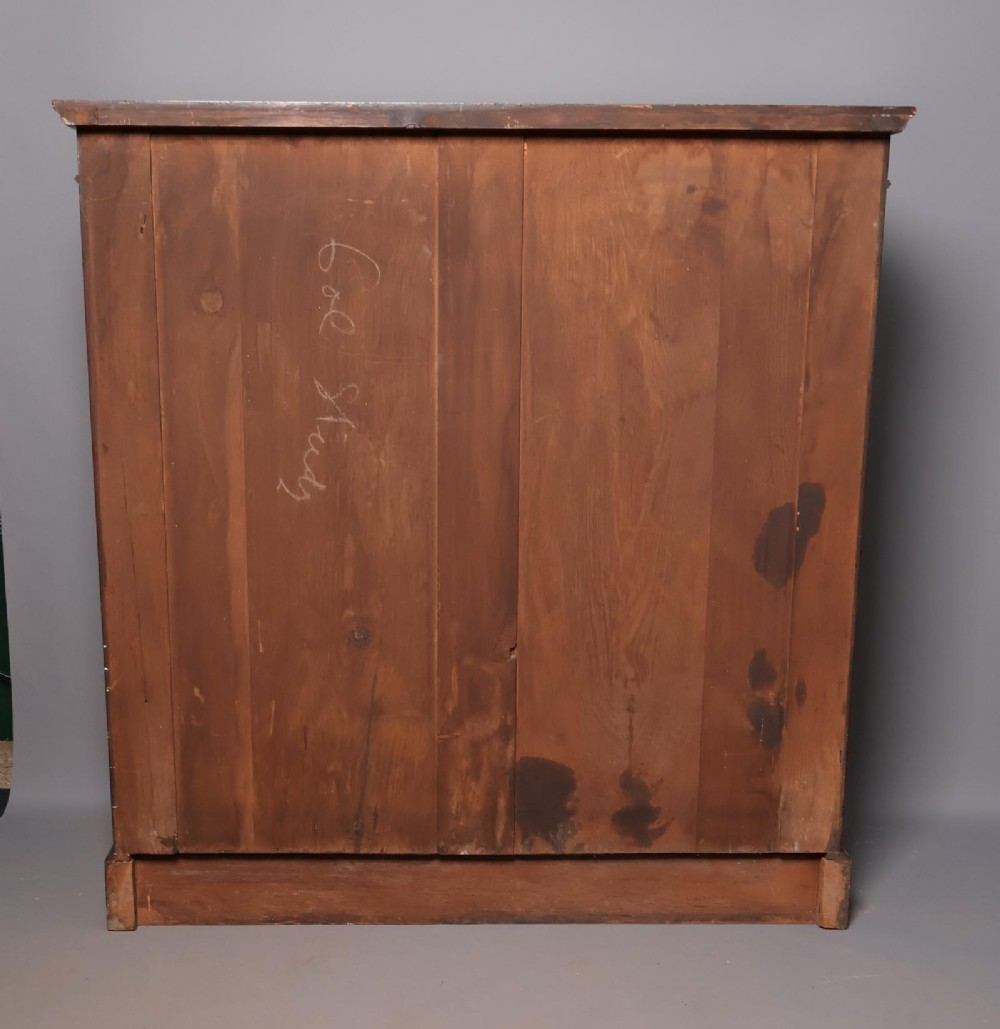An Edwardian open-front mahogany bookcase featuring four wide shelves and decorative inlaid borders along the frame. View XII