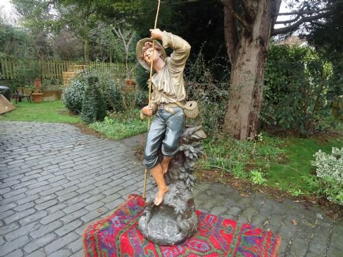 Terracotta Figure of a Boy Fishing