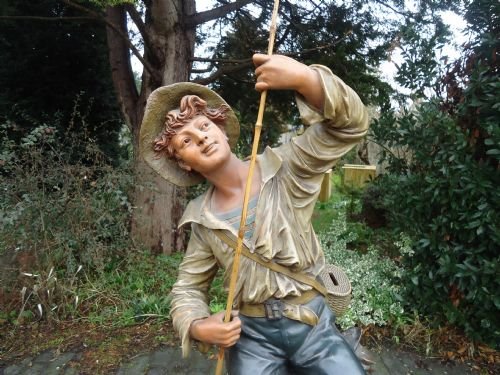 fig 1. TERRACOTTA FIGURE OF A BOY FISHING