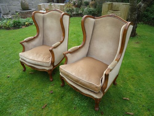 Pair of French Walnut Wingback Armchairs