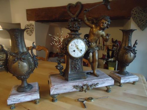 French Spelter Garniture Depicting the Butterfly Catcher