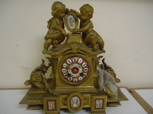 French Gilded Sevres Style Panelled Mantle Clock