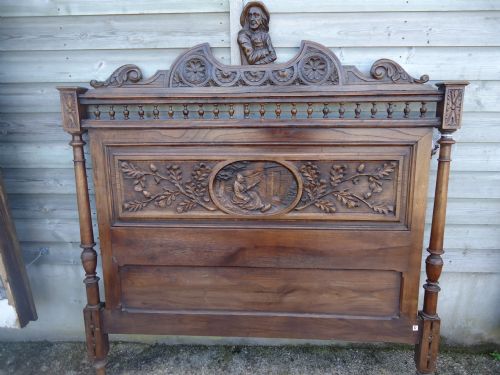 fig 1. Heavily carved Breton French 57 ins wide chestnut wood bed