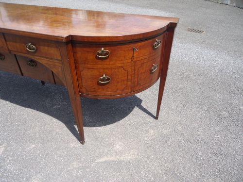 fig 1. 18th century mahogany bow ended sideboard