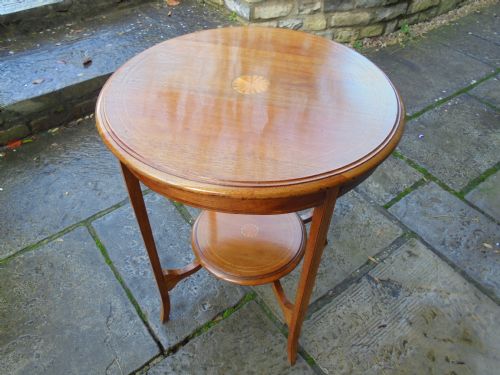 Circular Mahogany Two Tier Occasional Table with Sunburst Inlay on Each Level.