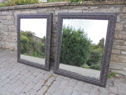 An Impressive Pair of Very Large Bevelled Glass Hanging Wall Mirrors.