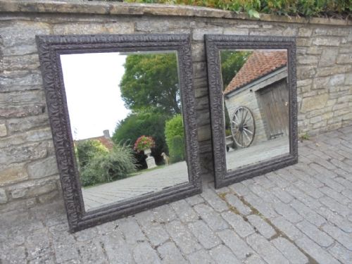 fig 1. An impressive pair of very large bevelled glass hanging wall mirrors.