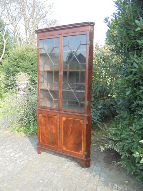 fig 1. 18th century glazed double corner cabinet