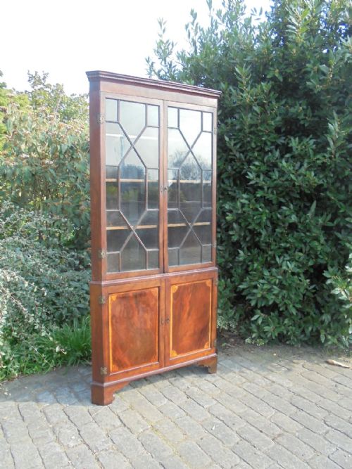fig 2. 18th century glazed double corner cabinet
