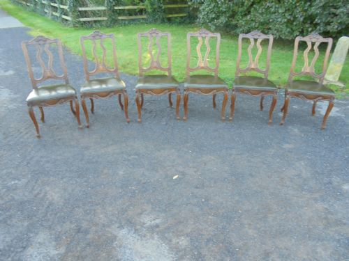 Set of Six French Carved Oak Dining Chairs with Leather Seats and High Back